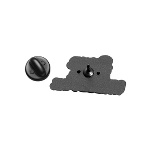 Detail view of black enamel pin back featuring metal base with a secure black rubber clutch
