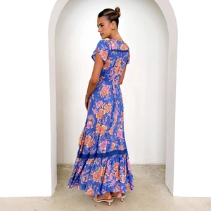 Elegant blue floral V-neck maxi dress with smocked waist and ruffled hem for summer