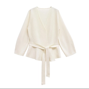 Women's cream white V-neck knit sweater with waist belt and padded shoulders