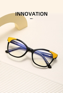 Detailed view of cat-eye anti-blue light glasses frame with yellow contrast accents