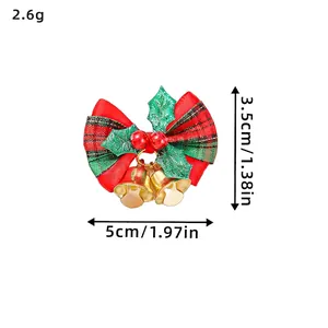 Christmas plaid bow with green leaves, red berries, and golden bells decoration