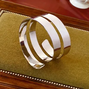 Minimalist silver multilayer spiral cuff bracelet with a polished mirror finish