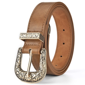 Detailed view of a brown faux leather belt featuring a vintage gold patterned buckle