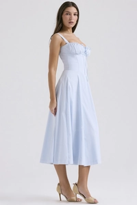 Detail view of light blue camisole midi dress with pleated bodice and lace-up front detail