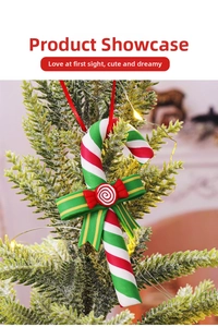 Close-up of candy cane ornament with red and green stripes on a snowy Christmas tree