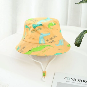 Orange kids sun hat featuring cartoon crocodile print and adjustable white windproof chin strap