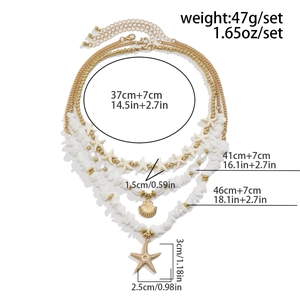Detail showing layered gold starfish necklace dimensions and sizes for beach jewelry set