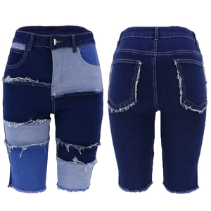 Women's mid-waist color-block denim shorts with frayed edges and slim fit design