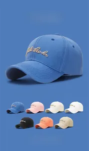 Detailed embroidery craft on cotton baseball caps in multiple colors for stylish outfits
