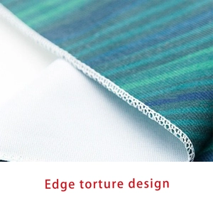 Close-up of high-density overlock edge stitching on linen placemat with autumn stripes
