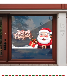 Detail of Santa Claus glass window sticker with Christmas greeting on a wooden door frame