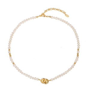 Irregular freshwater pearl choker with gold interlocking rings and adjustable chain