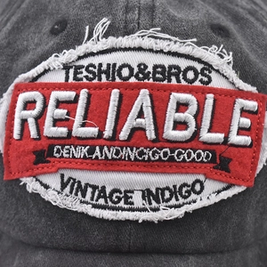 Vintage dark grey washed canvas baseball cap with detailed Reliable embroidery patch
