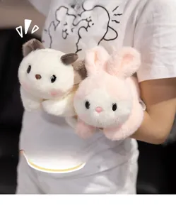 Close-up of soft plush cat and bunny toys with fluffy texture and cute plastic eyes