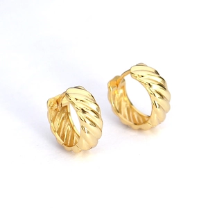 Classic 925 sterling silver golden twisted hoop earrings with a glossy metal finish