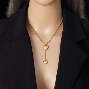 Minimalist gold-plated stainless steel snake chain necklace with double heart pendants