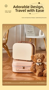 Detail view of pink and beige hard shell vanity cases with leather handles in a cozy home setting