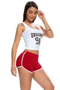 Detail of red athletic shorts with white tank top featuring Original 91 retro print