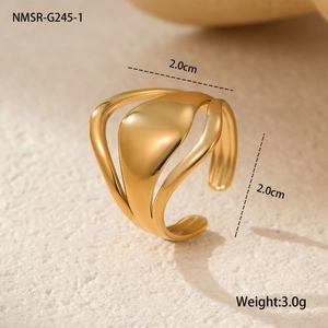 Detailed close-up of 18k gold plated stainless steel ring with abstract layered design