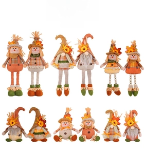 Detailed close-up of autumn harvest gnomes with sunflowers, maple leaves and straw hats