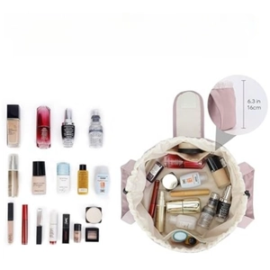 Pink drawstring barrel makeup bag with large capacity for travel toiletries storage