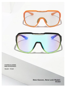 Close-up of oversized Y2K sports sunglasses with orange and gradient green-black frames