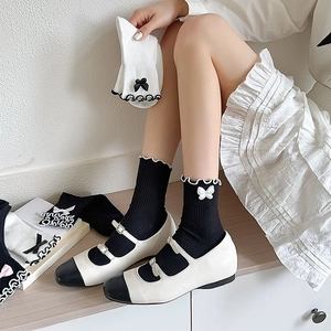 Lolita style JK stockings with ruffles and butterfly embroidery in black and white