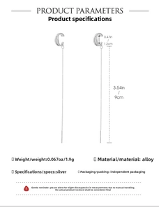 Detail view of silver long tassel clip earring with 9cm length and 1.2cm diameter