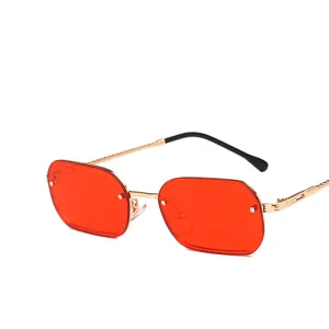 Fashion rimless sunglasses with orange rectangular lenses and gold metal frame