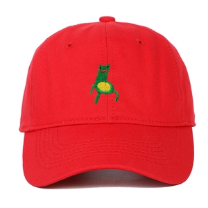 Detail of red cotton baseball cap with green frog embroidery and stitched eyelets