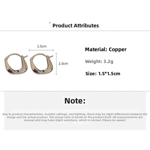 Detailed view of U-shaped gold-plated copper earrings with 1.5cm x 1.5cm dimensions