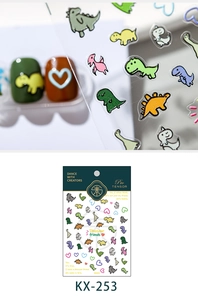 Close-up of 3D dinosaur cartoon nail art stickers with various colorful heart motifs