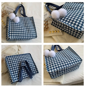 Four views of a blue houndstooth tote bag featuring white pom-poms and blue fabric handles