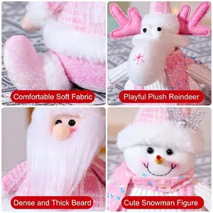Pink and white plush Christmas ornaments set featuring Santa, reindeer, and snowman dolls