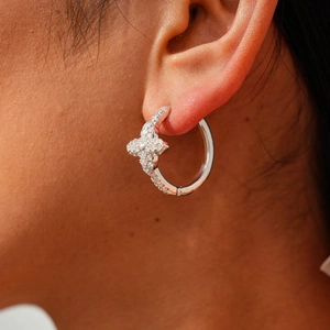 Silver flower earrings with zircons in a geometric floral hoop design for women