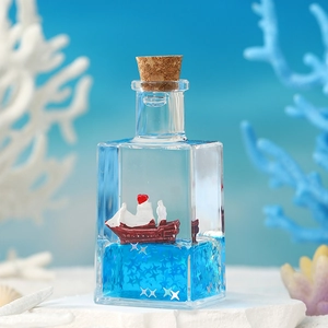 Creative drifting bottle desktop ornament with fluid ship and ocean waves display