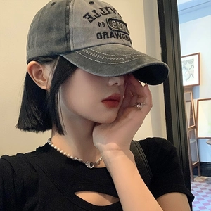 Vintage washed charcoal denim baseball cap with NYC embroidery and wide brim for women