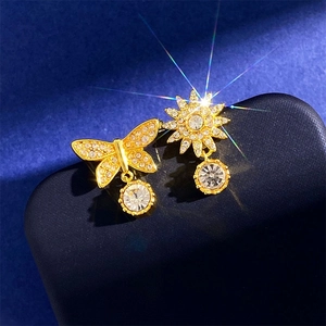 Golden asymmetrical butterfly star stud earrings with dazzling rhinestones and zircon drops