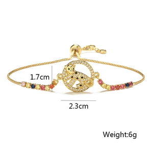 Detailed view of leopard charm pendant in gold finish with colorful zircon stones and dimensions