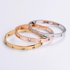 Minimalist 304 stainless steel bangles with cutout star design in gold, rose gold, and silver