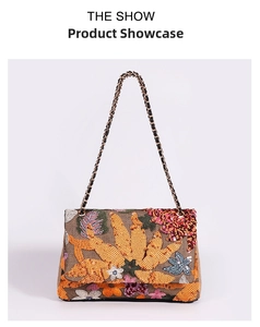 Close-up of bohemian shoulder bag with intricate yellow floral embroidery and sequins