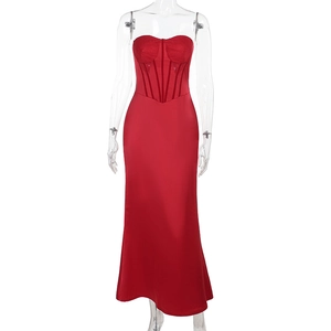 Detail of red satin maxi dress featuring elegant lace bodice and back zipper closure