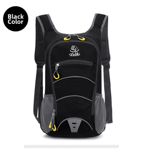Detail of black outdoor sports backpack with breathable gray mesh side pockets and logo