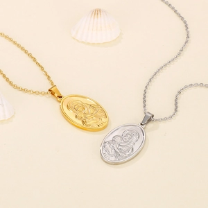 Gold and silver oval stainless steel necklaces with Madonna and child relief carving