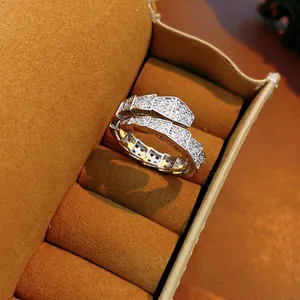 Luxury silver serpent ring with shimmering cubic zirconia in a premium velvet box