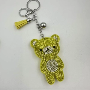 Portachiavi orsetto con strass giallo limone, hardware argento e nappa in pelle