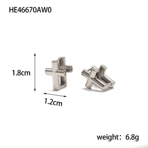 Detail view of silver cross earrings with dimensions 1.8cm by 1.2cm and weight 6.8g