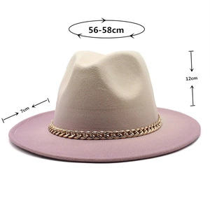 Detail showing gradient beige and pink wool fedora hat with gold chain decoration
