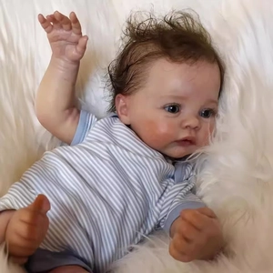 Realistic 49cm Reborn Baby Doll Meadow with 3D skin and blue eyes in blue striped romper