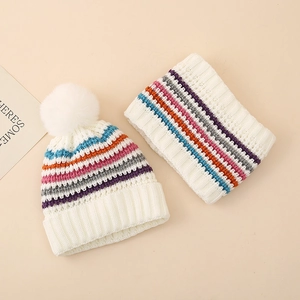 Winter knit set for girls featuring striped pompom hat and neck warmer in cream white